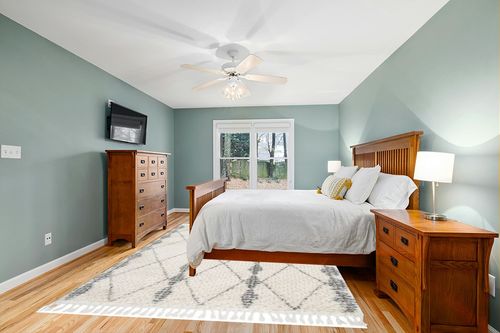 Geometric Beige Area Rug Dakota Fields Rug Size: Rectangle 7'10" x 11' in Teal and Orange Wood Bedroom