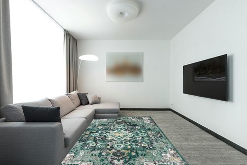 LUXE WEAVERS Moroccan Green 6x9 Medallion Area Rug for Living Rooms in Modern Living Room with Grey Couch