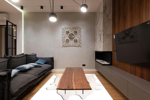 Natural Geneva Cowhide Area Rugs for Living Room and Bedroom | Handmade 100% Cow Rug with Low Pile | Shed-Resistant Home and Office Rug, Burgundy, 6 ft x 7 ft in Dark Wood Living Room with Black Couch