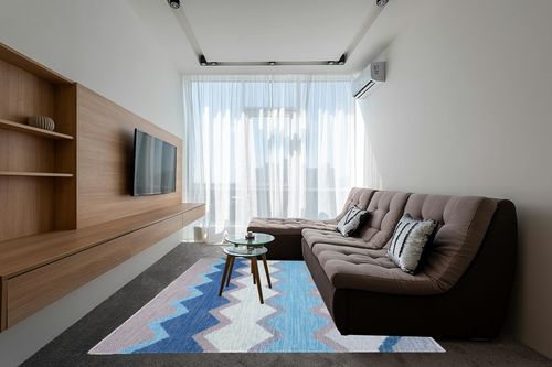 Dash & Albert Safety Net Handwoven Indoor/Outdoor Rug, 8 X 10 Feet, Blue/Grey Geometric Pattern in Grey Living Room with Brown Couch