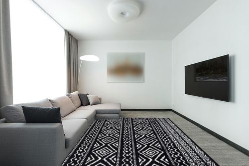 SAFAVIEH Tulum Collection Area Rug - 8' x 10', Black & Ivory, Moroccan Boho Distressed Design, Non-Shedding & Easy Care, Ideal for High Traffic Areas in Living Room, Bedroom (TUL267Z) in Modern Living Room with Grey Couch