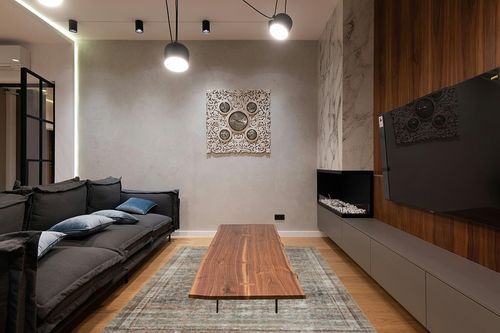 Chris Loves Julia x Loloi 7'6" 9'6" Ink/Terracotta Large Jules Jul-09 Area Rug in Dark Wood Living Room with Black Couch