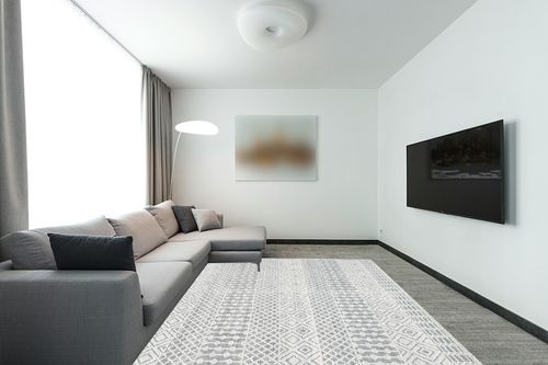 SAFAVIEH Natura Collection Area Rug - 8' x 10', Ivory & Black, Handmade Moroccan Boho Wool Fringe, Ideal for High Traffic Areas in Living Room, Bedroom (NAT852Z) in Modern Living Room with Grey Couch