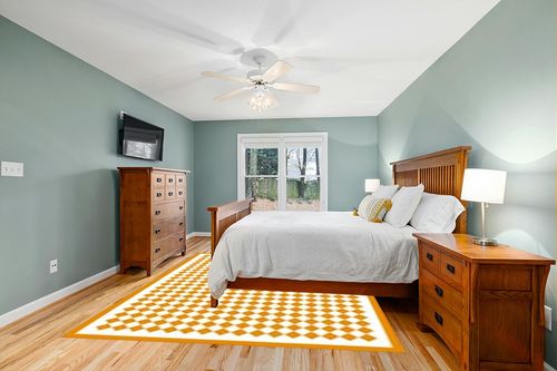 Washable 8x10 Checkered Area Rug for Living Room, Orange Checkerboard Modern Minimalist Large Foldable Rug, Ultra-Thin Low Pile Nonslip Indoor Carpet for Home Office Bedroom Playroom Classroom Dorm in Teal and Orange Wood Bedroom
