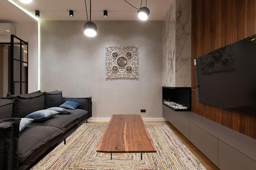 SAFAVIEH Cape Cod Collection Area Rug - 8' x 10', Beige & Multi, Handmade Boho Braided Jute & Cotton, Ideal for High Traffic Areas in Living Room, Bedroom (CAP202B) in Dark Wood Living Room with Black Couch