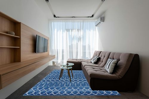 JONATHAN Y Moroccan Hype Boho Vintage Diamond, Bohemian, Easy-Cleaning, for Bedroom, Kitchen, Living Room, Non Shedding Area-Rugs, 8 X 10, Blue/White in Grey Living Room with Brown Couch