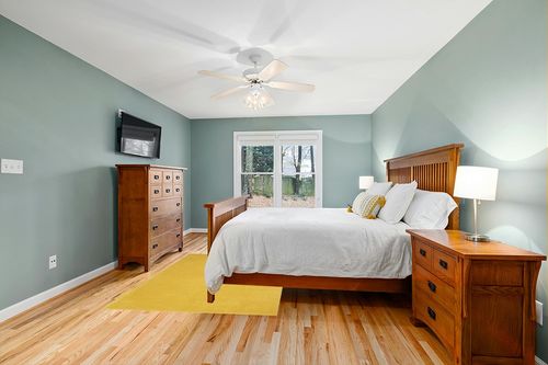 Nourison Essentials Indoor/Outdoor Yellow 5' x 7' Area Rug, Easy -Cleaning, Non Shedding, Bed Room, Living Room, Dining Room, Backyard, Deck, Patio (5x7) in Teal and Orange Wood Bedroom