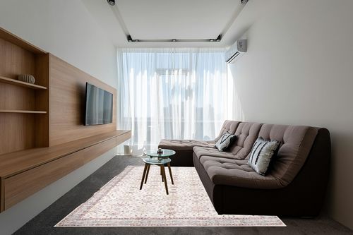 nuLOOM Gemma Machine Washable Transitional Floral Area Rug, 8x10, Beige in Grey Living Room with Brown Couch