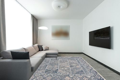 SAFAVIEH Aspen Collection Area Rug - 8' x 10', Blue & Beige, Handmade Boho Wool, Ideal for High Traffic Areas in Living Room, Bedroom (APN275M) in Modern Living Room with Grey Couch