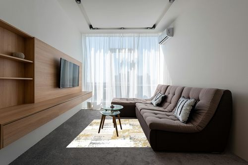 OIGAE Machine Washable Rug 5x7 - Low-Pile Area Rug Non-Shedding Foldable Abstract Modern Rugs, Stain Resistant Anti Slip Backing Rugs for Living Room&Bedroom&Dining Carpet Room Decor, Yellow in Grey Living Room with Brown Couch