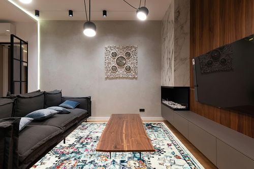 SAFAVIEH Madison Collection Area Rug - 9' x 12', Cream & Blue, Boho Chic Medallion Distressed Design, Non-Shedding & Easy Care, Ideal for High Traffic Areas in Living Room, Bedroom (MAD473B) in Dark Wood Living Room with Black Couch