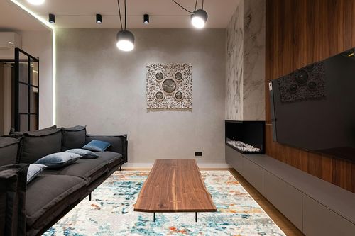 SAFAVIEH Madison Collection Area Rug - 9' x 12', Cream & Orange, Modern Abstract Design, Non-Shedding & Easy Care, Ideal for High Traffic Areas in Living Room, Bedroom (MAD478B) in Dark Wood Living Room with Black Couch