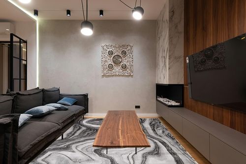 SAFAVIEH Craft Collection Area Rug - 8' x 10', Grey & Silver, Modern Abstract Design, Non-Shedding & Easy Care, Ideal for High Traffic Areas in Living Room, Bedroom (CFT819G) in Dark Wood Living Room with Black Couch