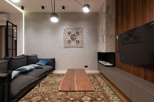 Loloi Magnolia Home by Joanna Gaines x Banks Brick/Ivory 8'-6" x 11'-6" Area Rug in Dark Wood Living Room with Black Couch