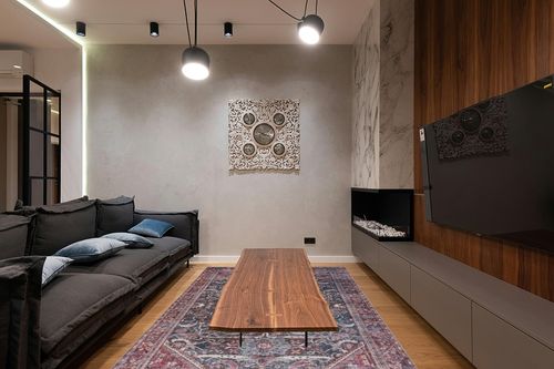 SAFAVIEH Tucson Collection Area Rug - 6' x 9', Dark Green & Rust, Persian Design, Non-Shedding Machine Washable & Slip Resistant Ideal for High Traffic Areas in Living Room, Bedroom (TSN175Y) in Dark Wood Living Room with Black Couch