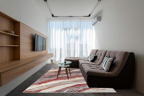 LUXE WEAVERS Lagos Collection 7983 Red 8x10 Art Deco Geometric Area Rug in Grey Living Room with Brown Couch