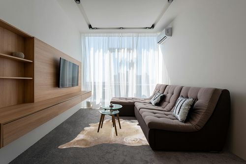 Genuine Taupe Grey Cowhide Rug 6 x 6-7 ft. 180 x 220 cm in Grey Living Room with Brown Couch