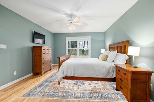 nuLOOM Jacquie Vintage Floral Area Rug, 9x12, Blue in Teal and Orange Wood Bedroom