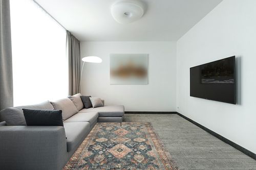 Loloi II Skye Collection SKY-10 SEA / RUST, Traditional 5'-0" x 7'-6" Area Rug in Modern Living Room with Grey Couch