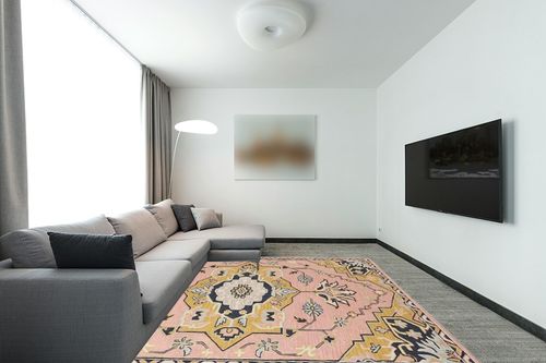 Restoration and Renovation Handmade Traditional Oriental Premium Wool Area Rug | Vintage-Inspired, Hand-Tufted Design with Multi-Colored Accents for Home Decor (Pink, 5' Round) in Modern Living Room with Grey Couch
