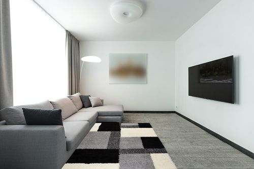 ruglots Modern Shag Geometric 5x7 (5' x 7'2'') Area Rug Cubes Black & Cream Plush Shag Blocks & Squares Plush Shag Easy Care Thick Soft Plush Living Room in Modern Living Room with Grey Couch