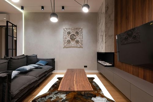 Appaloosa Cowhides Natural Cowhide Rug - Tricolor Cowhide Area Rug for Bedroom & Living Room - Luxury Cowhides Modern Accent Rug - Genuine Leather with Real Animal Fur, Medium, 6 x 8 Feet in Dark Wood Living Room with Black Couch
