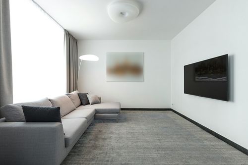 SAFAVIEH Brentwood Collection Area Rug - 9' x 12', Ivory & Grey, Modern Abstract Design, Non-Shedding & Easy Care, Ideal for High Traffic Areas in Living Room, Bedroom (BNT822A) in Modern Living Room with Grey Couch