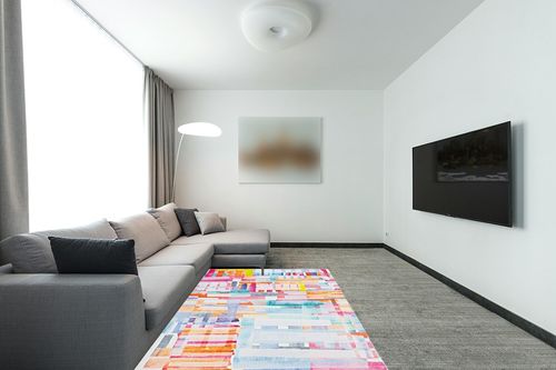 Linon Painterly Swatch Printed Lux Soft Faux Rabbit 5' X 7' Area Rug in Pink and Blue in Modern Living Room with Grey Couch