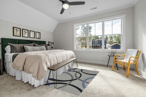 HomeRoots 5' X 7' Ivory Blue and Gray Geometric Area Rug in Grey Traditional Bedroom with King Bed