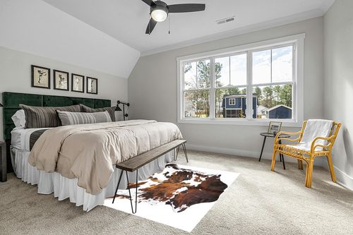 rodeo Genuine Cowhide Rug: Hand-Picked & Authentic Real Cowhide Rug for western Home Decor -TEXAS rug Cow Hide Rug Large Sized at 6x7ft - Rustic rug, Unique, Durable, Leather Cow Carpet Rugs -Tricolor in Grey Traditional Bedroom with King Bed