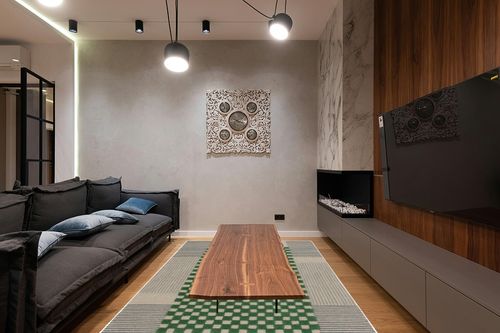 SAFAVIEH Genre Collection Area Rug - 6' x 9', Grey & Green, Handmade Wool, Ideal for Living Room, Bedroom, Dining (GRE207F-6) in Dark Wood Living Room with Black Couch