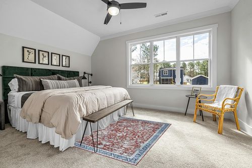 COZYLOOM 5x7 Vintage Bohemian Distressed Rug Oriental Floral Printed Rug Boho Chenille Soft Floor Cover for Living Room Bedroom Non-Slip Low Pile Washable Rug Foldable Thin Red in Grey Traditional Bedroom with King Bed
