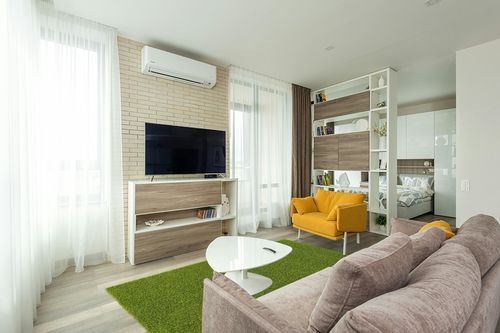 Unique Loom Solid Shag Collection Area Rug (5' 1" x 8' Rectangle, Grass Green) in Light Modern Living Room with TV
