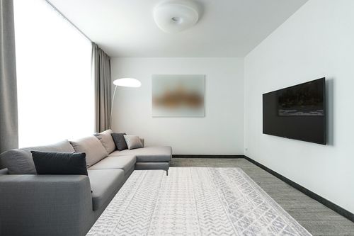Artistic Weavers Chester Boho Moroccan Area Rug,7'10" x 10'3",Grey in Modern Living Room with Grey Couch