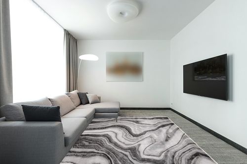 SAFAVIEH Craft Collection Area Rug - 8' x 10', Grey & Silver, Modern Abstract Design, Non-Shedding & Easy Care, Ideal for High Traffic Areas in Living Room, Bedroom (CFT819G) in Modern Living Room with Grey Couch