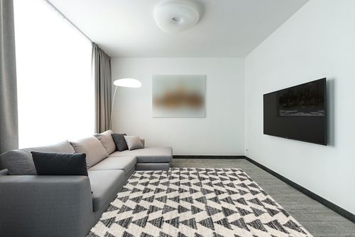 JONATHAN Y MOH206A-8 Aisha Moroccan Triangle Geometric Indoor Farmhouse Area-Rug Bohemian Minimalistic Easy-Cleaning Bedroom Kitchen Living Room Non Shedding, 8 X 10, Cream,Black in Modern Living Room with Grey Couch