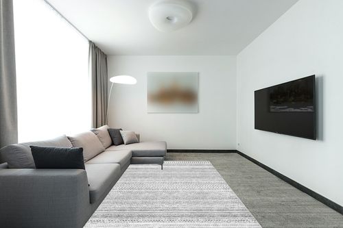 nuLOOM Kira Machine Washable Tribal Geometric Area Rug, 6x9, Grey in Modern Living Room with Grey Couch