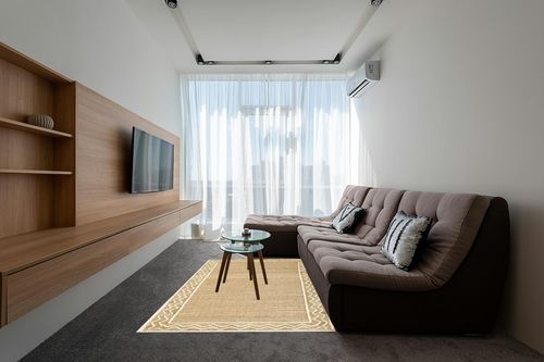 Erin Gates Orchard Border 5' x 8' Area Rugs with Natural ORCHAORC-1NAT5080 in Grey Living Room with Brown Couch