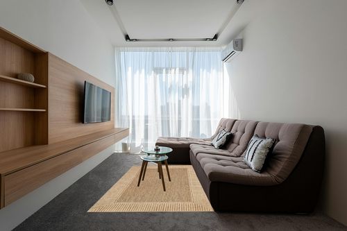 nuLOOM Asha Simple Border Indoor/Outdoor Area Rug, 5' x 8', Light Brown in Grey Living Room with Brown Couch