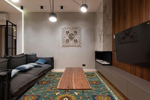 SAFAVIEH Heritage Collection Area Rug - 8' x 10', Light Blue, Handmade Traditional Oriental Wool, Ideal for High Traffic Areas in Living Room, Bedroom (HG651A) in Dark Wood Living Room with Black Couch