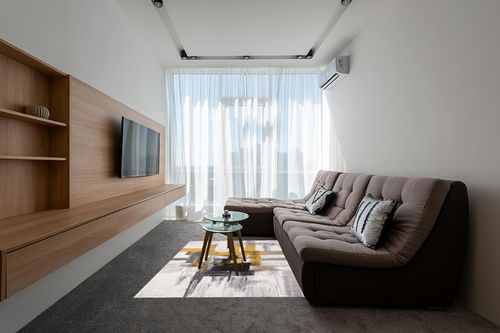 Gold Modern Stain Resistant Living Room Area Rug in Grey Living Room with Brown Couch