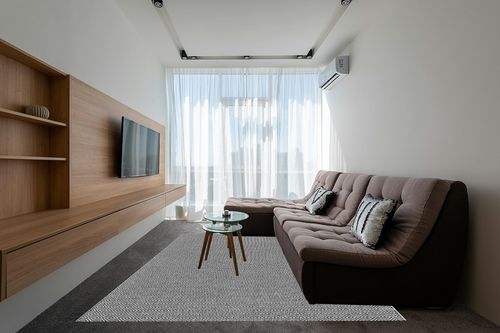 nuLOOM Lorretta Geometric Cotton Area Rug, 8x10, Black in Grey Living Room with Brown Couch