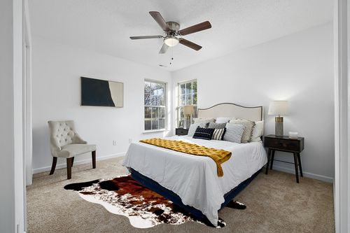 CONBEN Oversized Faux Cowhide Rug (6.3ft x 8.3ft) - Non-Slip Backing, Cow Print Decor - Farmhouse, Western Floor Rugs for Living Room, Bedroom, Dining Area or Office in White and Yellow Modern Bedroom