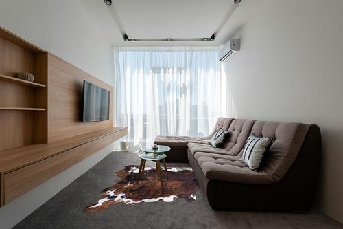 rodeo Classic Brown Brindle Cowhide Rug XXL 6x8 Ft in Grey Living Room with Brown Couch