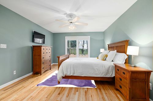 Natural Geneva Cowhide Area Rugs for Living Room and Bedroom | Handmade 100% Cow Rug with Low Pile | Shed-Resistant Home and Office Rug, Purple, 6 Ft x 7 Ft in Teal and Orange Wood Bedroom