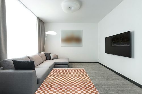 Hauteloom Pertek Checkered Tile Living Room Bedroom Dining Room Area Rug - Bohemian Boho Carpet - Square Tile Farmhouse - Faded Distressed - Cream, Beige, Light Red, Somon - 5'3" x 7' in Modern Living Room with Grey Couch
