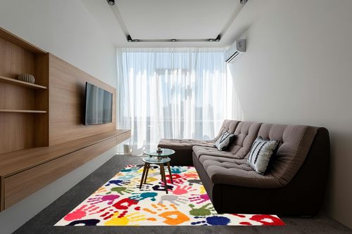 nuLOOM Pinkie Handprint Kids Area Rug, 8x10, Multi in Grey Living Room with Brown Couch