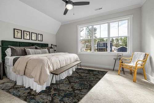 Linon Vintage Collection Grey Clara 9' x 12' Area Rug in Grey Traditional Bedroom with King Bed
