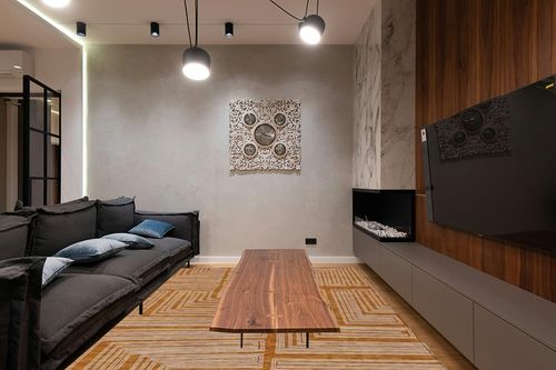 Addison Rugs Chantille ACN1045 Orange 9' x 12' Indoor Outdoor Area Rug, Easy Clean, Machine Washable, Non Shedding, Bedroom, Entry, Living Room, Dining Room, Kitchen, Patio Rug in Dark Wood Living Room with Black Couch