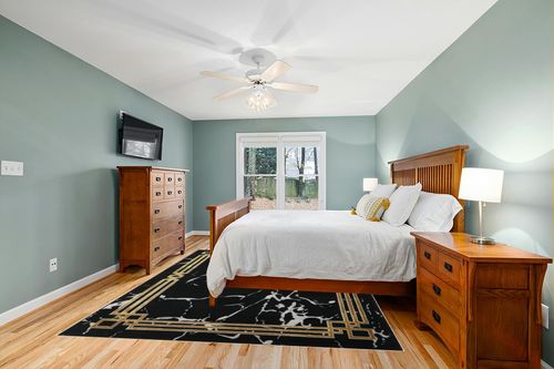 Antep Rugs Babil Gold 8x10 Abstract Marble Geometric Indoor Area Rug (Black, 7'10" x 10') in Teal and Orange Wood Bedroom